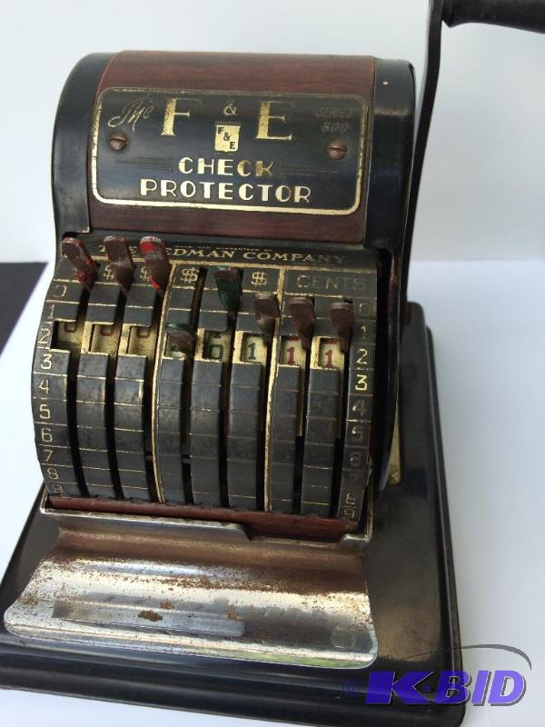 lot 5 image: Antique Check Protector