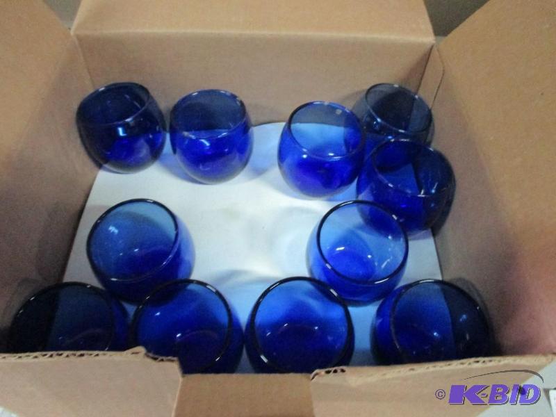 Blue roly poly votive holders...