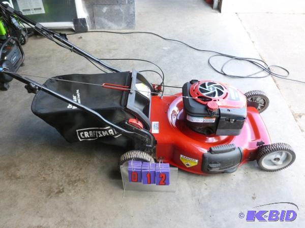 lot 12 image: Craftsman self propelled lawn mower. Approx 2...
