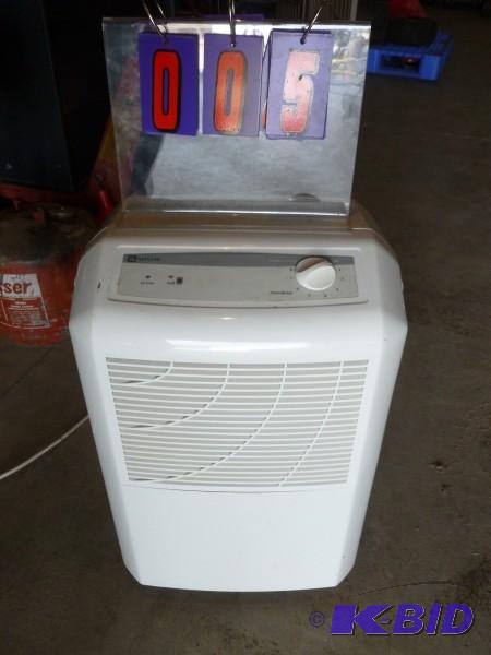 lot 5 image: Maytag dehumidifer. Appears lightly used. Pow...