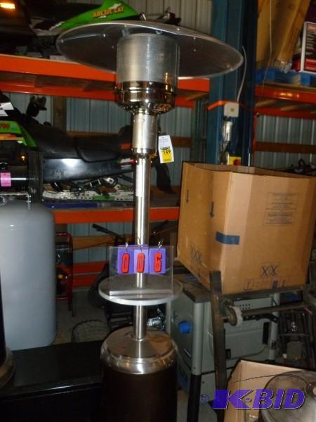 lot 6 image: Patio heater. Stainless construction. Appears...