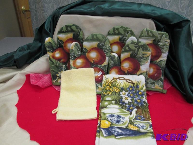 Qty 7 oven mitts, towel, and dish rag with ap...
