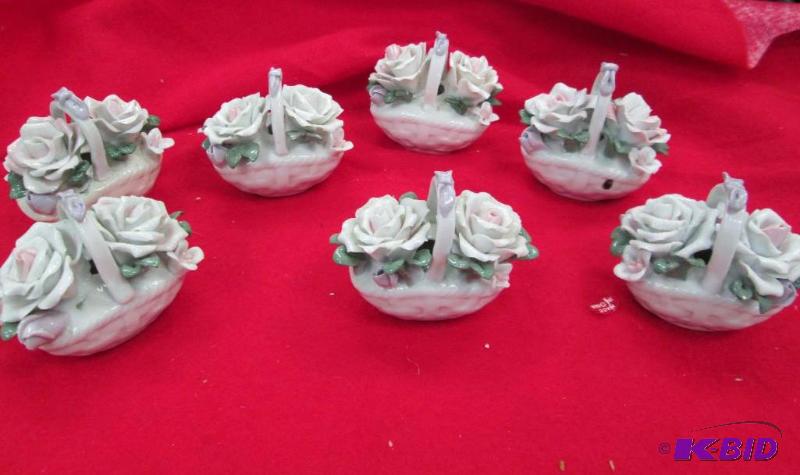 Qty 7 Ceramic basket of flowers...