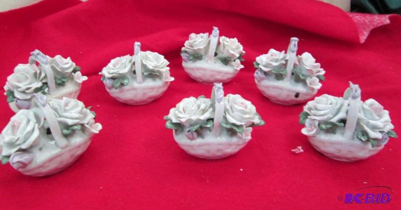 Qty 7 Ceramic basket of flowers...