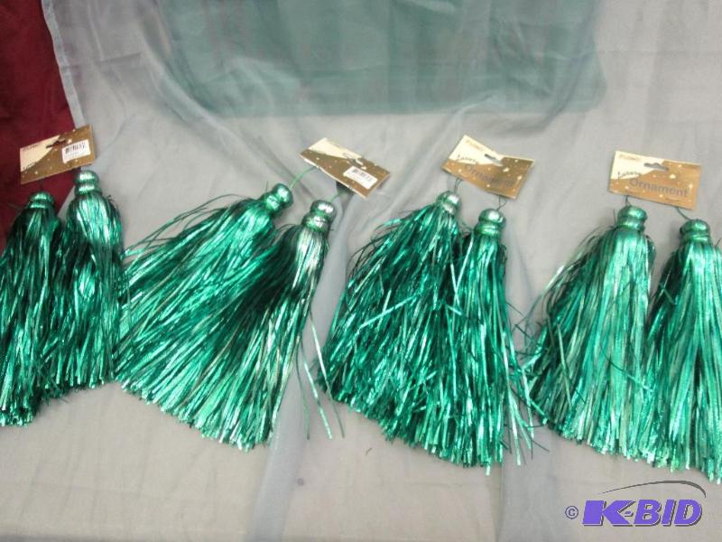 green tassle ornaments. Qty. 4...