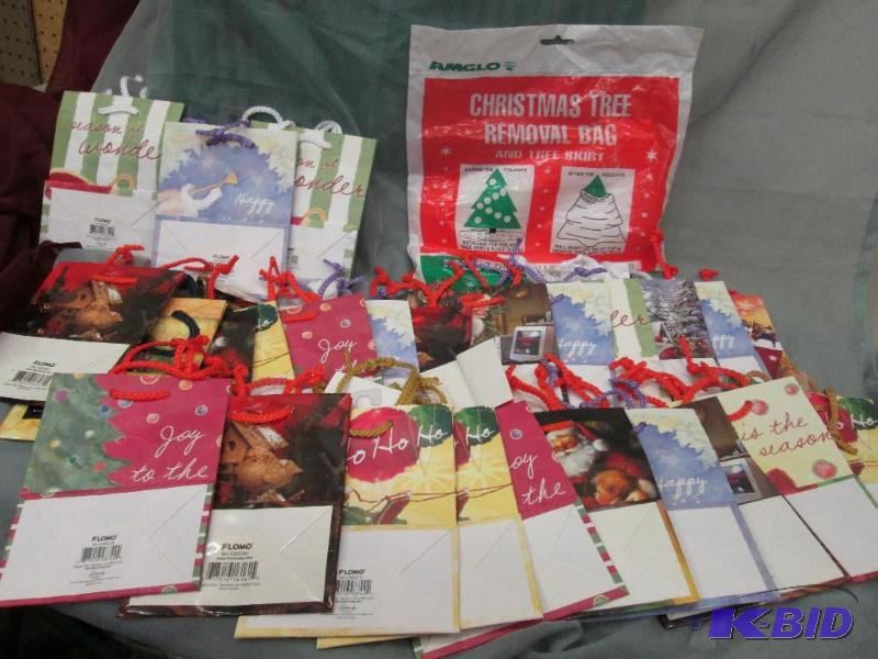 25 small size gift bags and 1 tree removal ba...