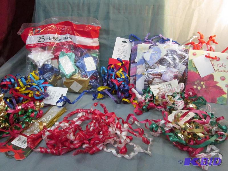 6 small bags and 6 curly ribbon bows...