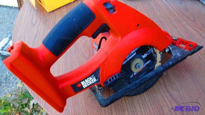 lot 105 image: Cordless saw, battery NOT included...