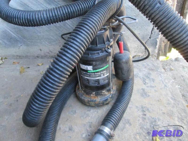 lot 20 image: Wayne .5 hp Cast iron sump pump with hose...