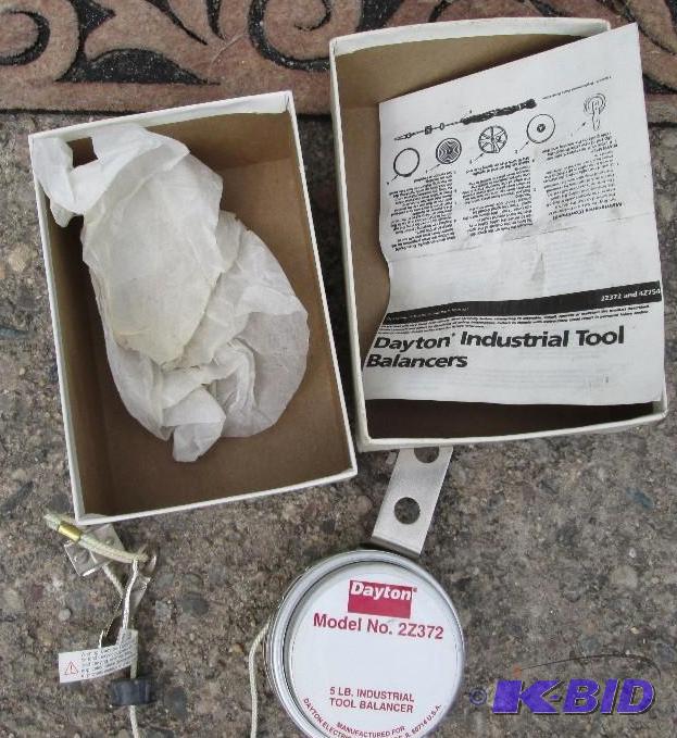 lot 209 image: Dayton 5 pound industrial tool balancer...