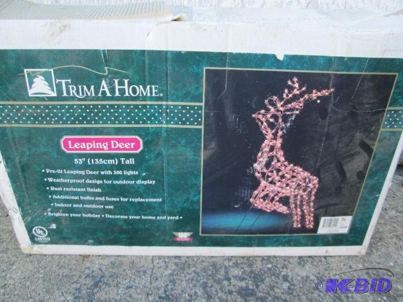 lot 34 image: Leaping deer ornament, appears new...