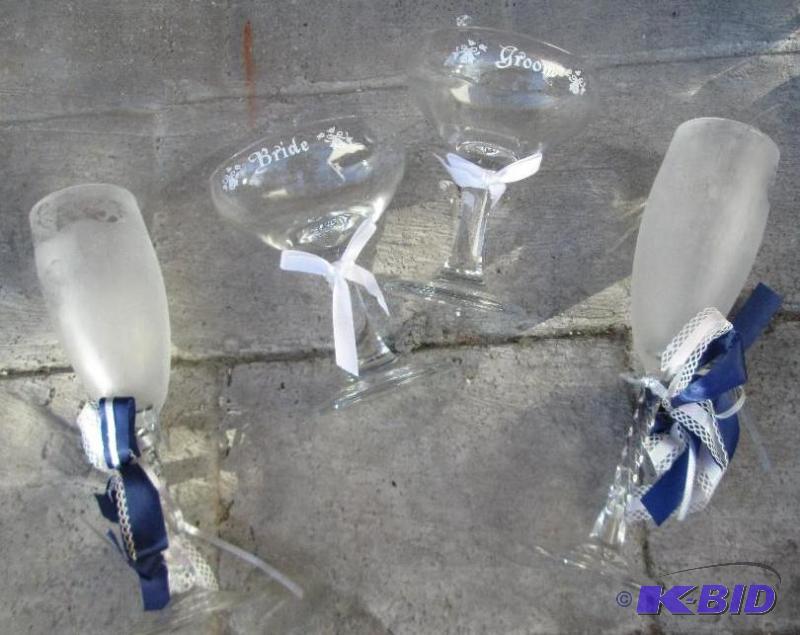 lot 42 image: Bride groom and frosted champagne glasses...