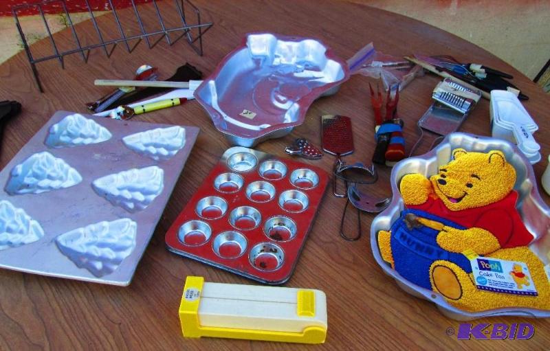 lot 90 image: Pooh baking pan and other assorted kitchen ut...