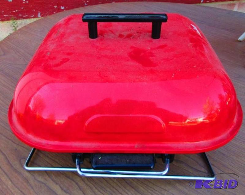 lot 97 image: Small charcoal grill, like new...