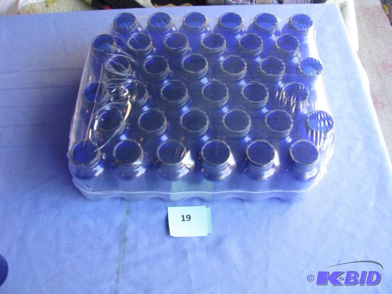 lot 19 image: 32 Cobalt Blue Jars. 200ml, new in package...