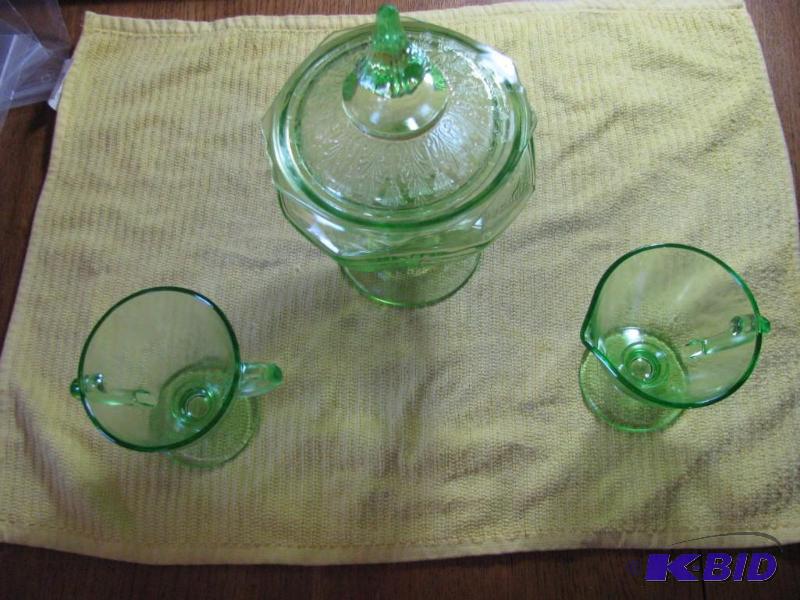 lot 71 image: Green vaseline glass, cream sugar set and ped...