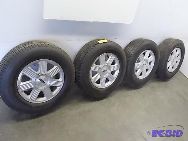 lot 36 image: Lincoln 6 Lug Alloy Rims with Michelin Cross ...