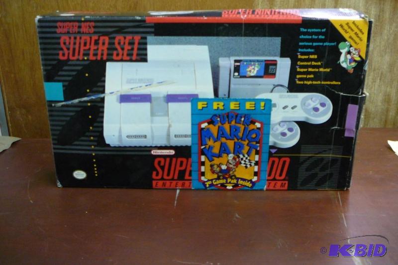 lot 32 image: Super Nintendo set in box...