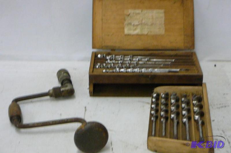 lot 5 image: Vintage hand drill and box of bits...