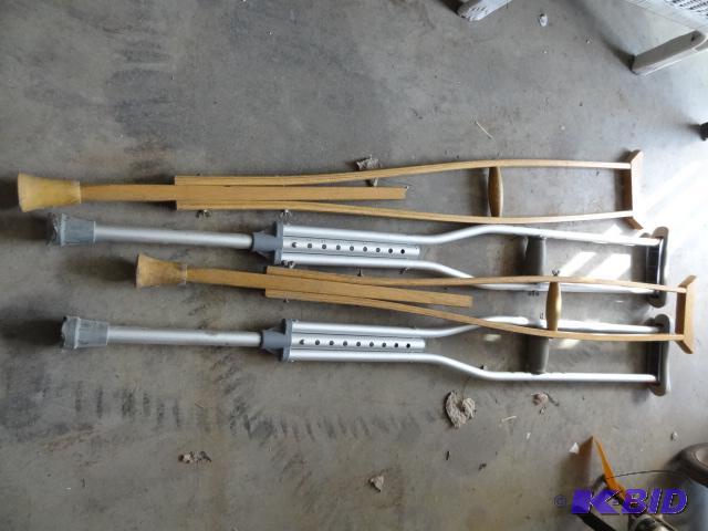 lot 118 image: Aluminum and wood crutches...