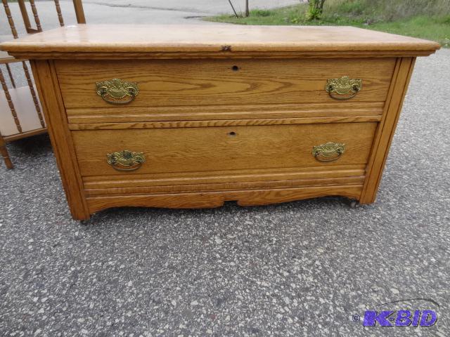 lot 12 image: Vintage wood 2 drawer dresser on wheels. D.W....