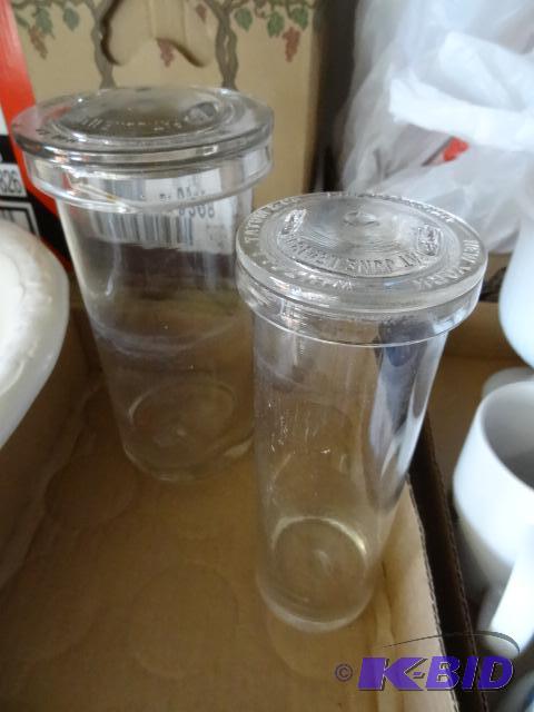 lot 123 image: 2 glass canisters with lids...