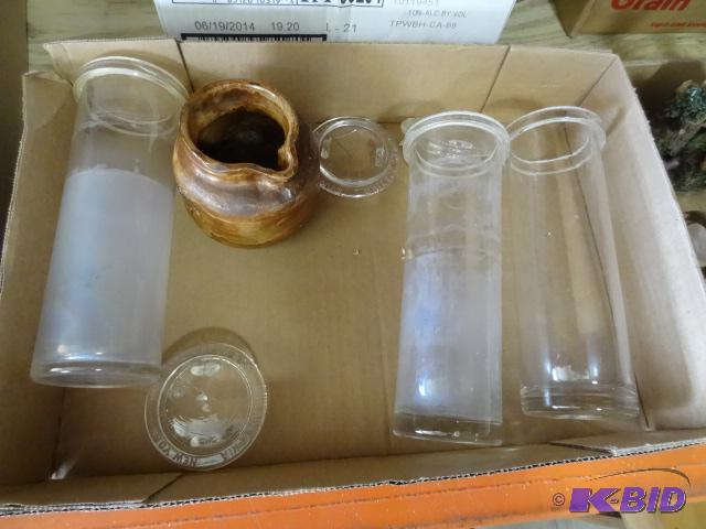 lot 129 image: 3 glass canisters with lids...
