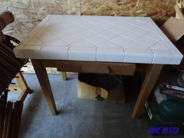 lot 2 image: Tile top wood framed table with pull out draw...