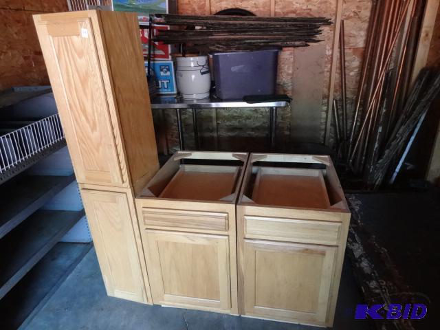 lot 59 image: 4 wood cabinets. New. 2 uppes are 12 x 13 x 3...