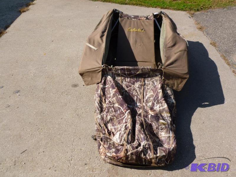 lot 1 image: Large Cabelas camouflaged laying down goose ...