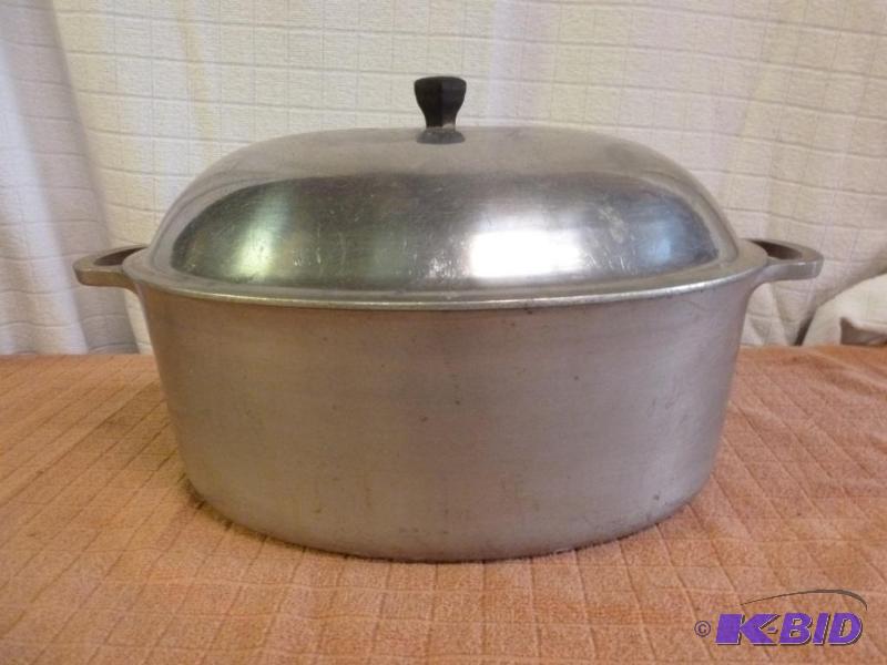 lot 130 image: Large Vintage Majestic Cookware cast aluminum...
