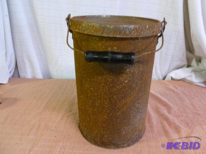 lot 134 image: Vintage metal shotgun container with lid that...