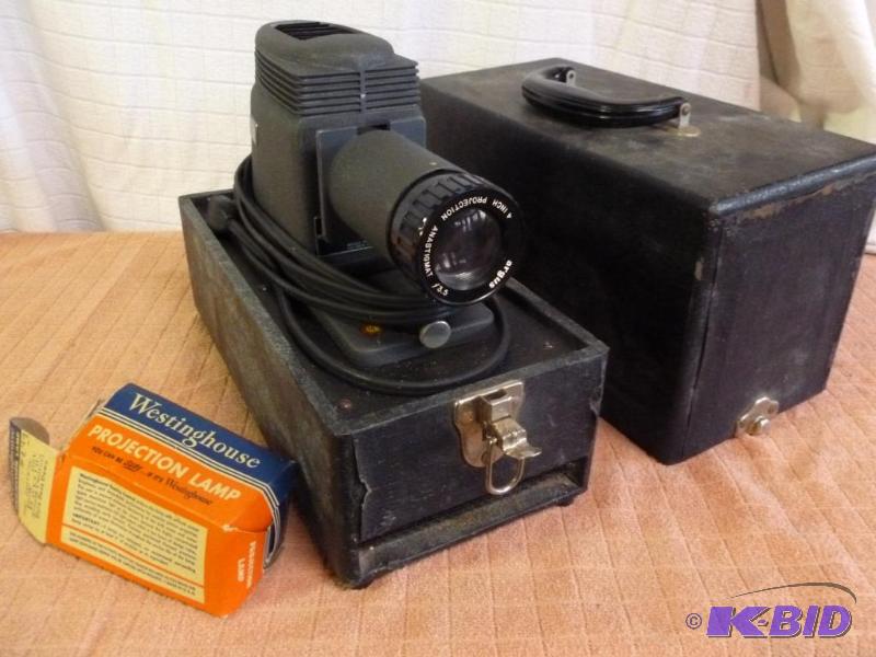 lot 135 image: Vintage Argus film projector, comes with an e...