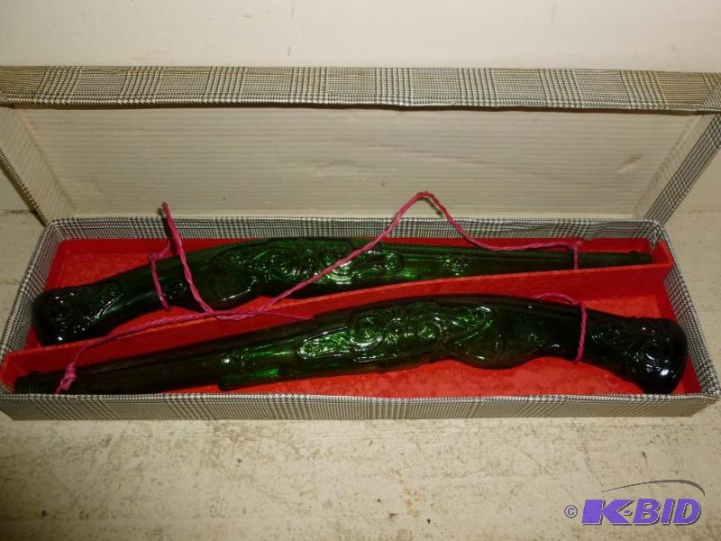 lot 155 image: Vintage embossed green glass wall gun decorat...
