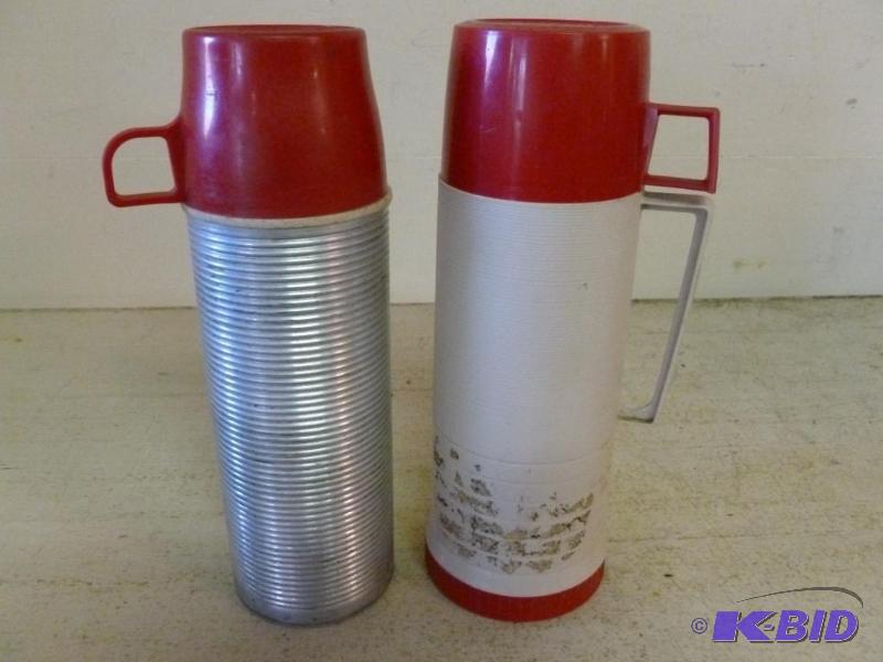 lot 207 image: Lot of two vintage Thermos jugs....