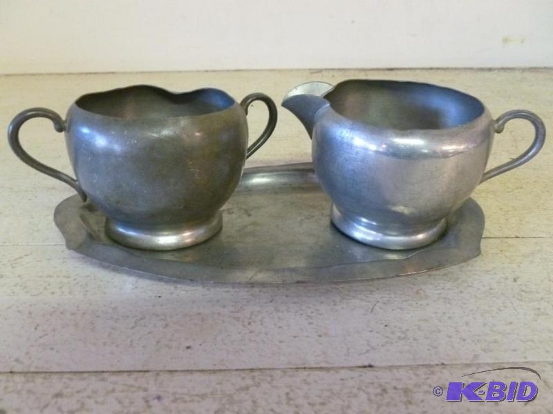 lot 208 image: Vintage genuine pewter cream and sugar set....