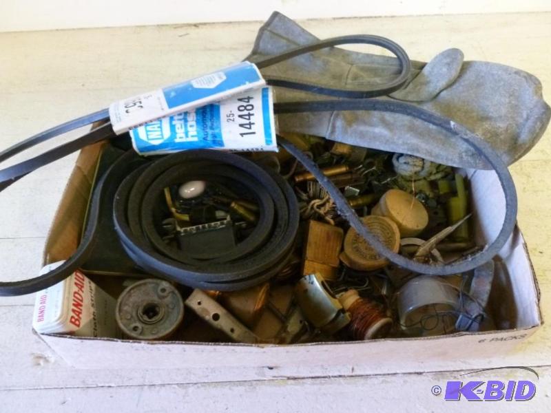 lot 219 image: This lot consists of automotive belts, brass ...