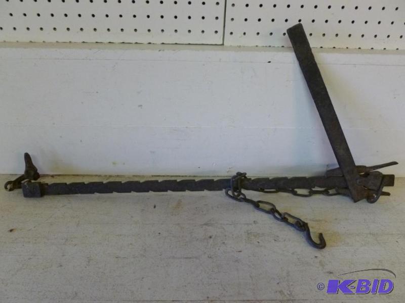 lot 231 image: Large antique iron fence stretcher that meas...
