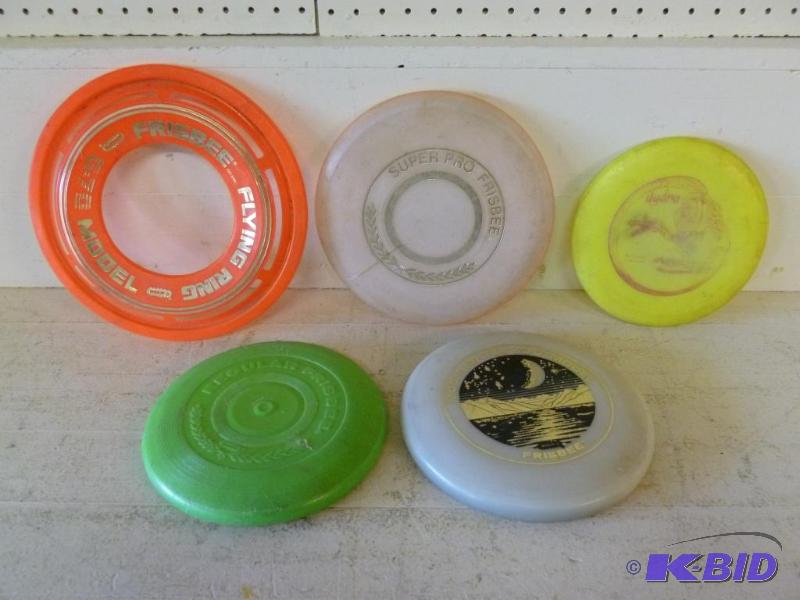 lot 27 image: This lot consists of four Frisbees and a Inno...