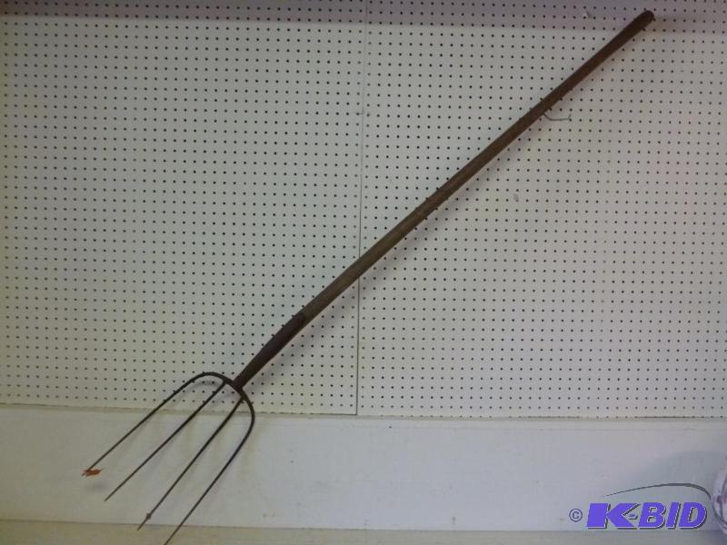 lot 52 image: Heavy duty four tine fork, measures 69" ...