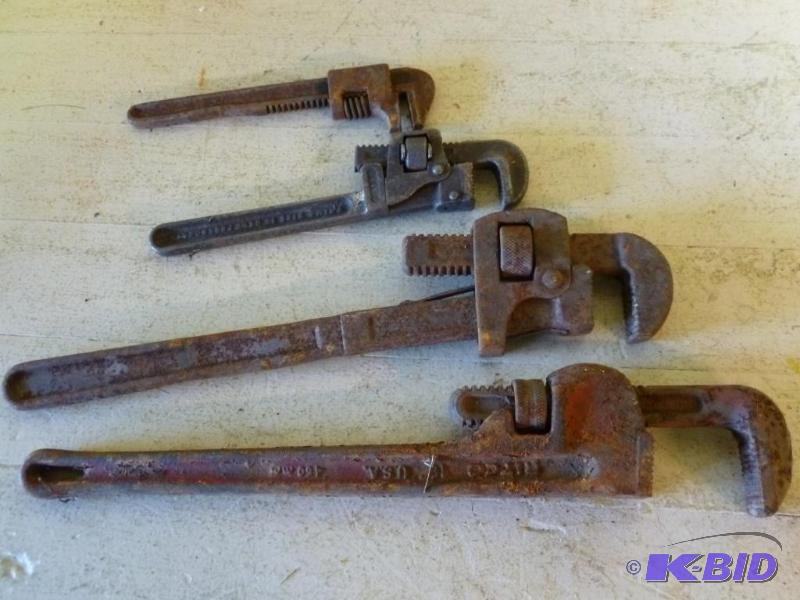 lot 63 image: Lot of four pipe wrenches that includes a Rid...