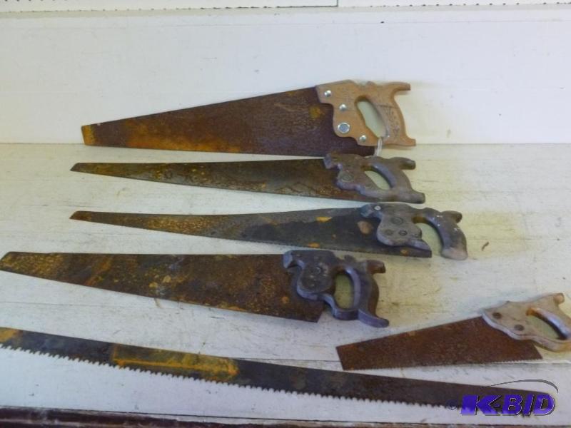 lot 74 image: This lot consists of five hand saws and a buc...