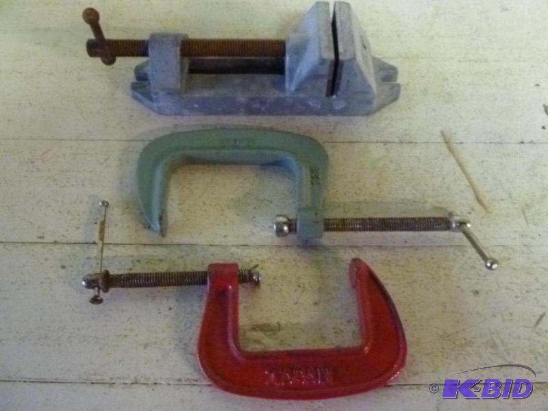 lot 89 image: This lot consists of two c-clamps and a bench...