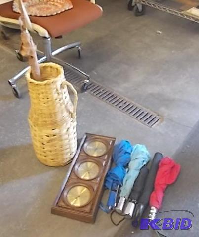 lot 45 image: Wicker Umbrella Stand Basket, Assorted Umbrel...