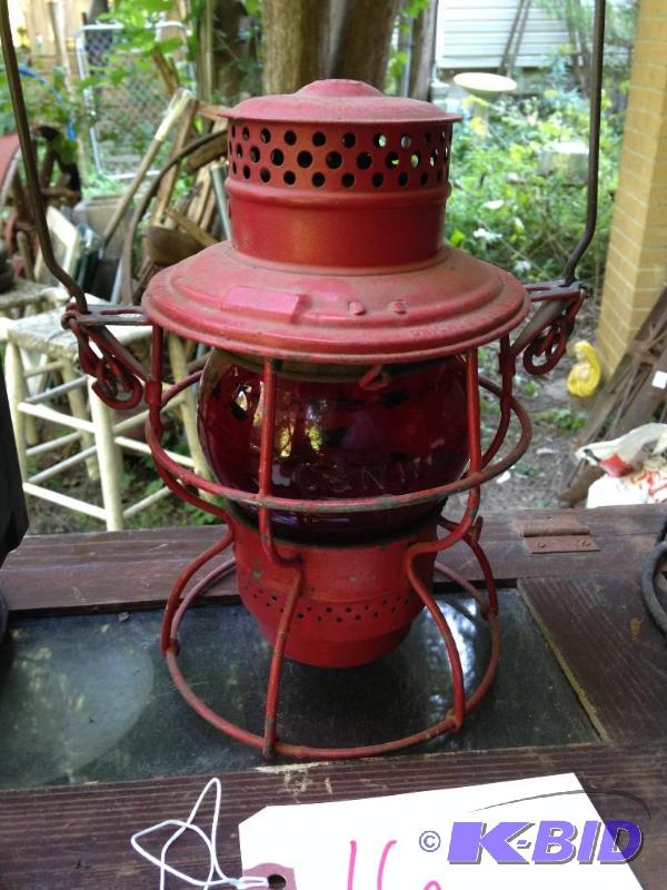 lot 16 image: C & N Rail yard Lantern with red globe.