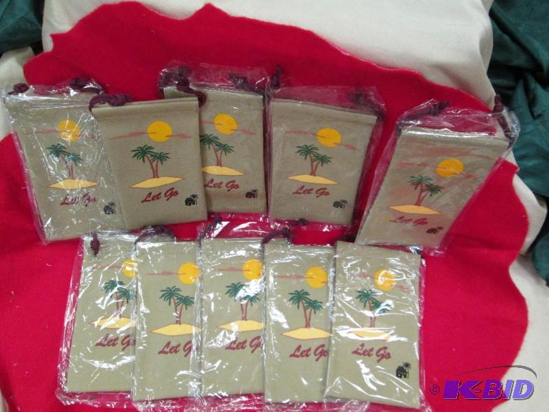 Qty 10 small tan bags that has a tree with su...