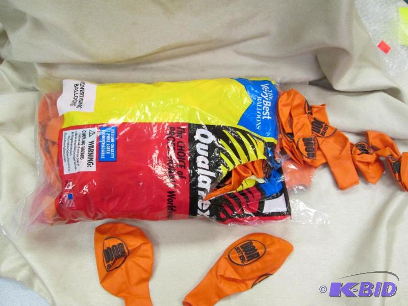 1 large bag of advertising balloons that says...