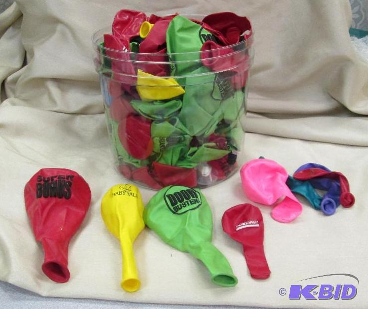 A container full of advertising balloons and ...