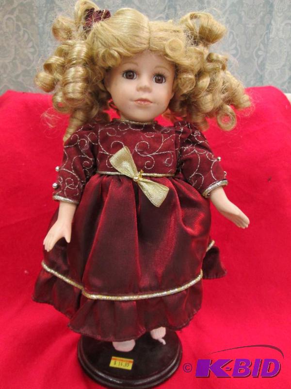 A little girl in a dress and come with stand...