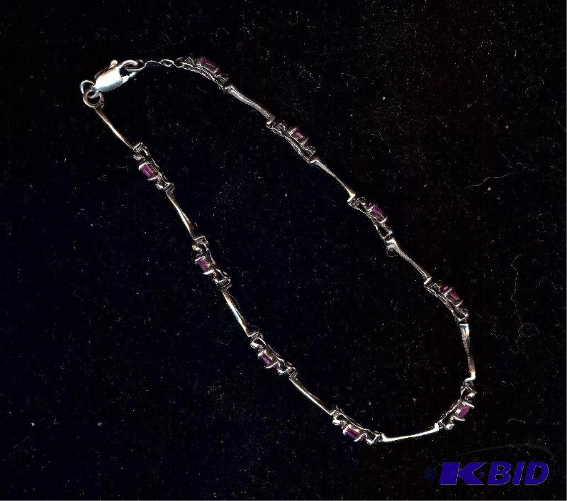 Ceylon and Sapphire curve bracelet 10 karat w...